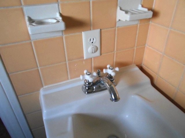 gfci distance above bathroom sink