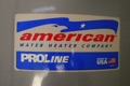 How do I tell the age of an American ProLine water heater from the serial number?