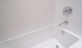 What is the minimum ceiling height over a bathtub?