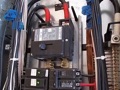 Why is bundled wiring in an electric panel a defect?