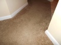Do home inspectors lift up the carpet to look for cracks in the floor?
