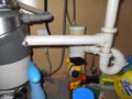 What is a combination waste and vent in a plumbing system?
