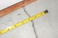 Why do cracks sometimes suddenly appear in walls and floors?
