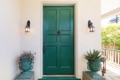 Do I need to have two exterior exit doors in my house?