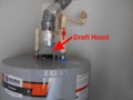 What is backdrafting at a gas water heater?