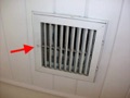 Why is there an air conditioning vent (register) outside on the ceiling of the porch?