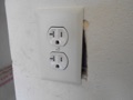What is the maximum gap allowed by NEC around a flush-mounted receptacle outlet box and adjacent drywall?