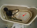 What is the white plastic tank inside my toilet tank?
