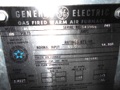 How can I determine the age of a GE (General Electric) gas furnace or air conditioner from the serial number?