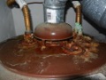 What causes water dripping down the flue (condensation) at a gas water heater?