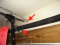 Can the a garage door header bracket and torsion springs be mounted through drywall?