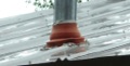 Why is the base of the gas flue at the roof red?