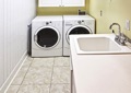 Can a laundry sink drain be installed without a trap under it?