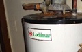 How do I tell the age of a Lochinvar water heater from the serial number?
