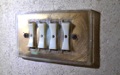 What are those strange looking wall switches in houses from the 1950s and 1960s?