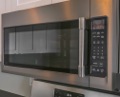 Does a home inspector check the microwave oven?
