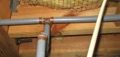 What type water supply and drain (DWV) pipes were commonly used for 1980s residential plumbing?