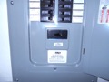 Can I mount an electric panel upside down?
