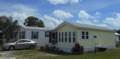 What is the minimum size of a mobile/manufactured home per HUD standards?