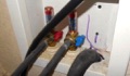 Why are rubber washing machine hoses a safety risk?