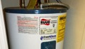 How do I tell the age of a Ruud water heater from the serial number?