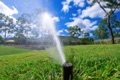 What devices are code approved for backflow prevention at a sprinkler (lawn irrigation) system?