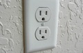 What locations are exempt from the tamper resistant receptacle requirement by code?