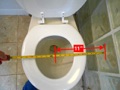 What are the minimum clearances around a toilet?