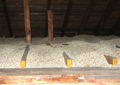 Why is vermiculite attic insulation a problem for both buyers and sellers of a home?