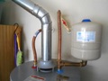 What does a home inspector check at a water heater?