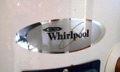 How do I tell the age of a Whirlpool water heater from the serial number?