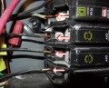 What does it mean when a wire is overstripped at a circuit breaker?